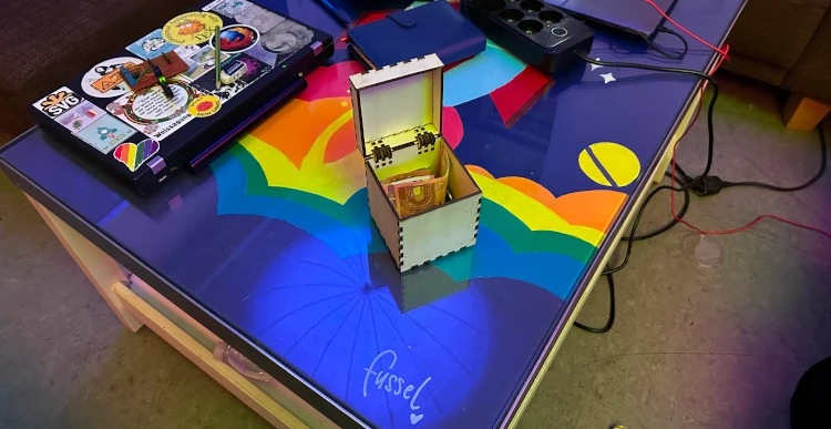 Donation box on a table at Metalab