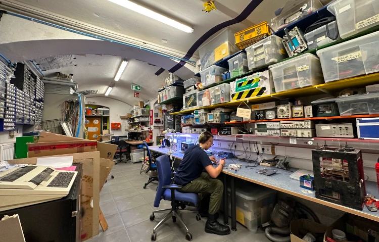 A person soldering at the Whatever Lab